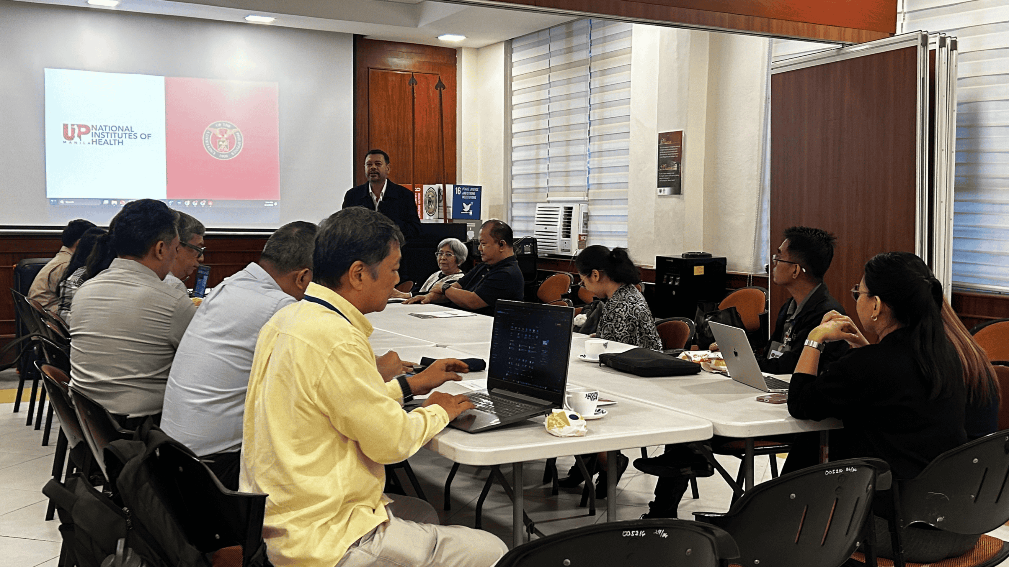 NIH Deputy Director for Strategic Initiatives and Emerging Programs Dr. John Mark S. Velasco delivers welcome remarks during the HLARQC project meeting.